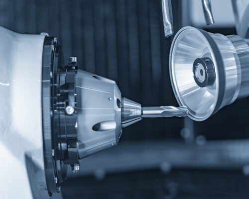 The operation of tool making machine control by computer program.Cutting tool making machine control by CNC program. The CNC carbide cutting tool manufacturing process by grinding machine